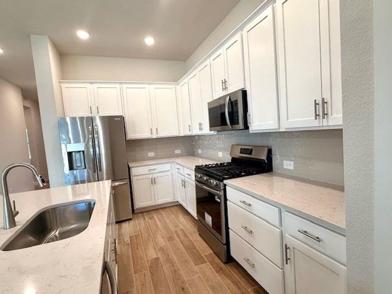 Furnished interior view inside a new home in Audubon 45' Homesites, Magnolia (Image 6). Furnished interior view inside a new home in Audubon 45' Homesites, Magnolia (Image 6).