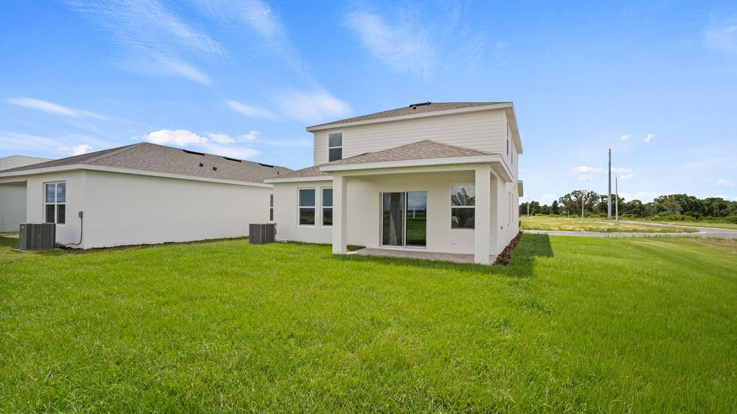 The Naples Back Exterior Quick Move-In Home at Willowbrook North by DRB Homes in Winter Haven, FL The Naples Back Exterior Quick Move-In Home at Willowbrook North by DRB Homes in Winter Haven, FL