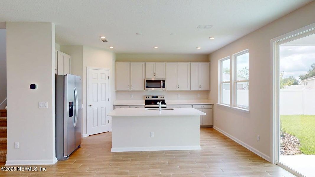 Furnished interior view inside a new home in Sandridge Hills, Green Cove Springs (Image 5). Furnished interior view inside a new home in Sandridge Hills, Green Cove Springs (Image 5).