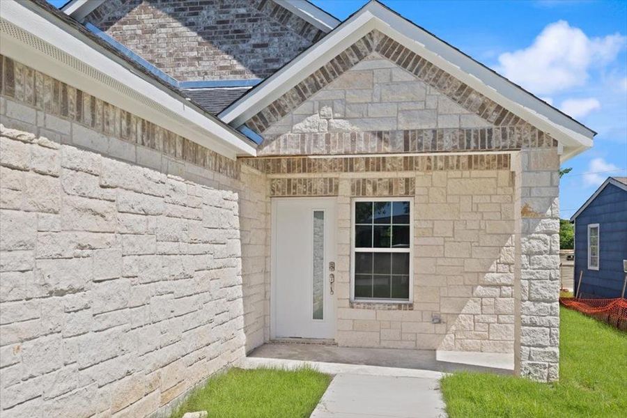 Front exterior of a new home in , Royse City, TX, highlighting curb appeal (Image 20). Front exterior of a new home in , Royse City, TX, highlighting curb appeal (Image 20).