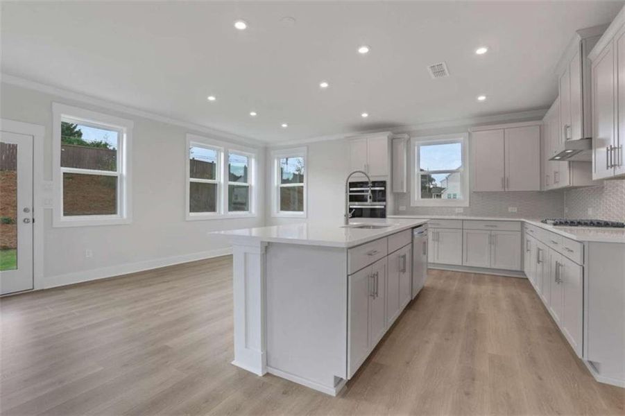 Furnished interior view inside a new home in The Paddocks at Doc Hughes, Buford (Image 7).