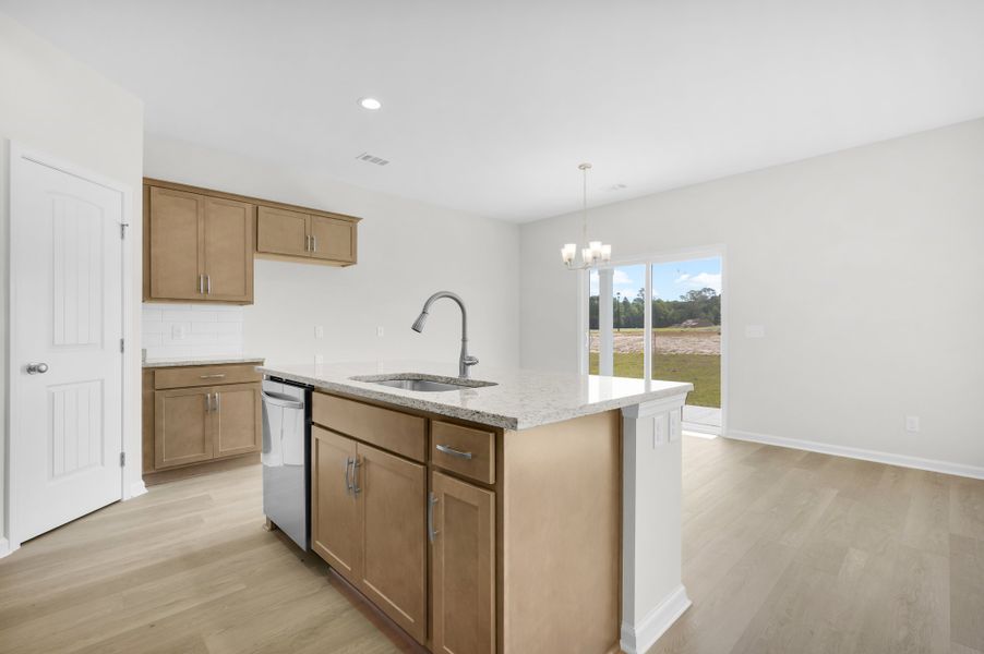 Representative furnished interior of a home built from the The Magnolia by Smith Family Homes in Lakeview Pines, Statesboro (Image 29).