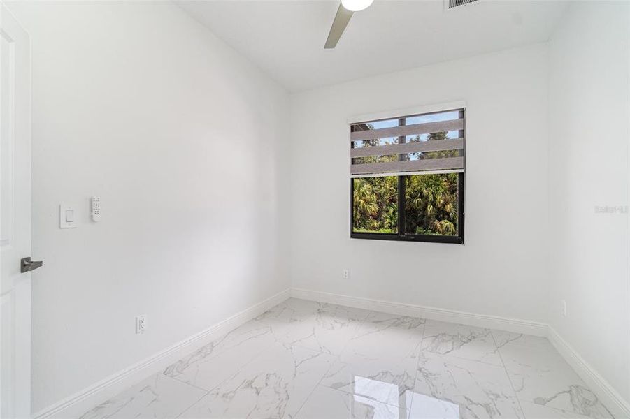 Spacious, unfurnished interior of a new home in , Port Charlotte (Image 18).