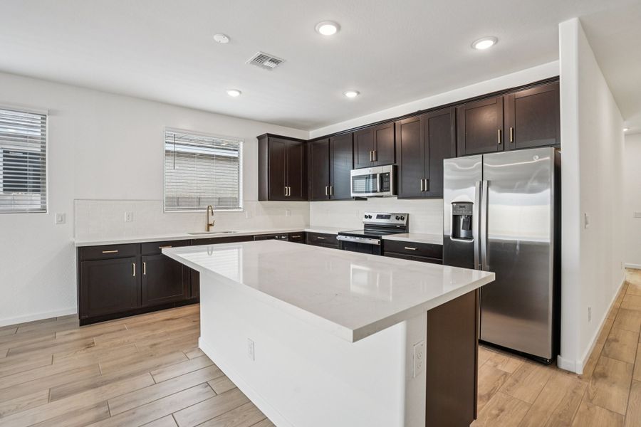 Kitchen featuring the Oxford Collection. Finishes and colors may vary by community.