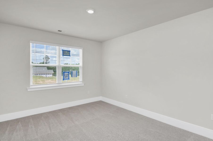 Spacious, unfurnished interior of a new home in The Cove at Mallard Crossing, Summerville (Image 11).