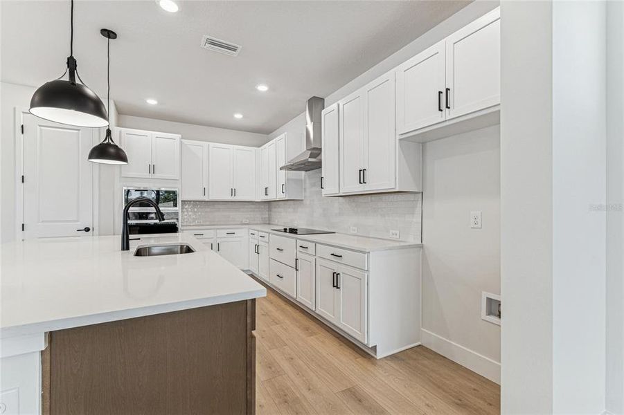 Furnished interior view inside a new home in North River Ranch - Cottage Series, Parrish (Image 10).