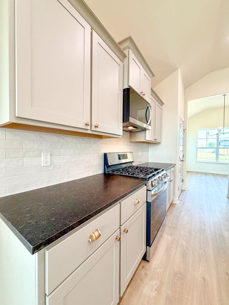 Furnished interior view inside a new home in TerraVista, Victoria (Image 10).