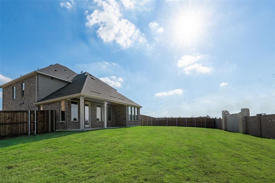 Exterior details and patio area of a home in Arbors at Legacy Hills, Celina (Image 3). Exterior details and patio area of a home in Arbors at Legacy Hills, Celina (Image 3).