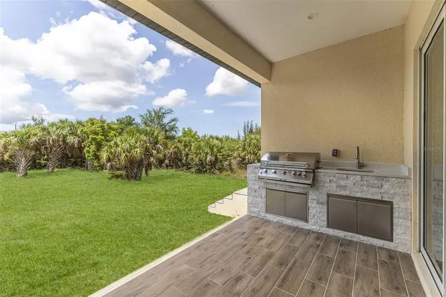 Exterior details and patio area of a home in , Port Charlotte (Image 3). Exterior details and patio area of a home in , Port Charlotte (Image 3).