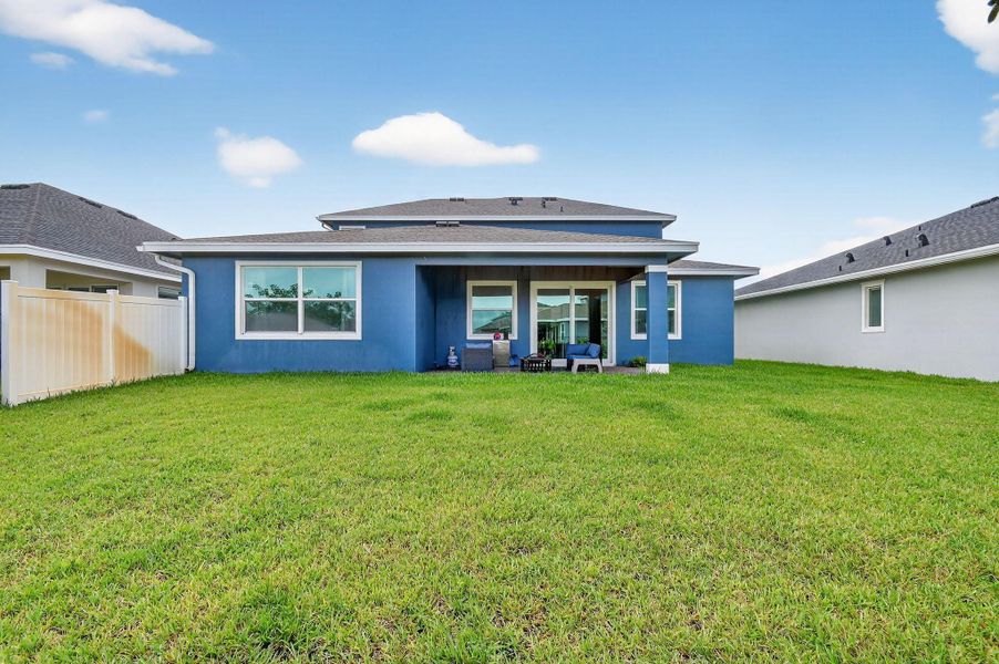 Front exterior of a new home in , Loxahatchee, FL, highlighting curb appeal (Image 2).