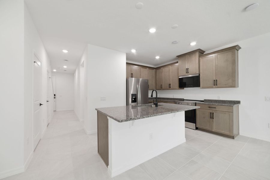 Furnished interior view inside a new home in Towns at Greenleaf, Oviedo (Image 10).