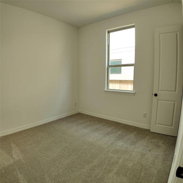 Spacious, unfurnished interior of a new home in Wildrye, Waller (Image 10).