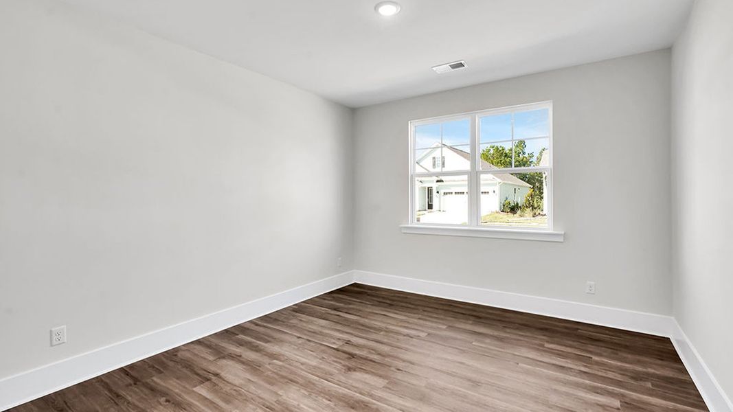 Spacious, unfurnished interior of a new home in The Haven at Indigo Preserve, Leland (Image 16).
