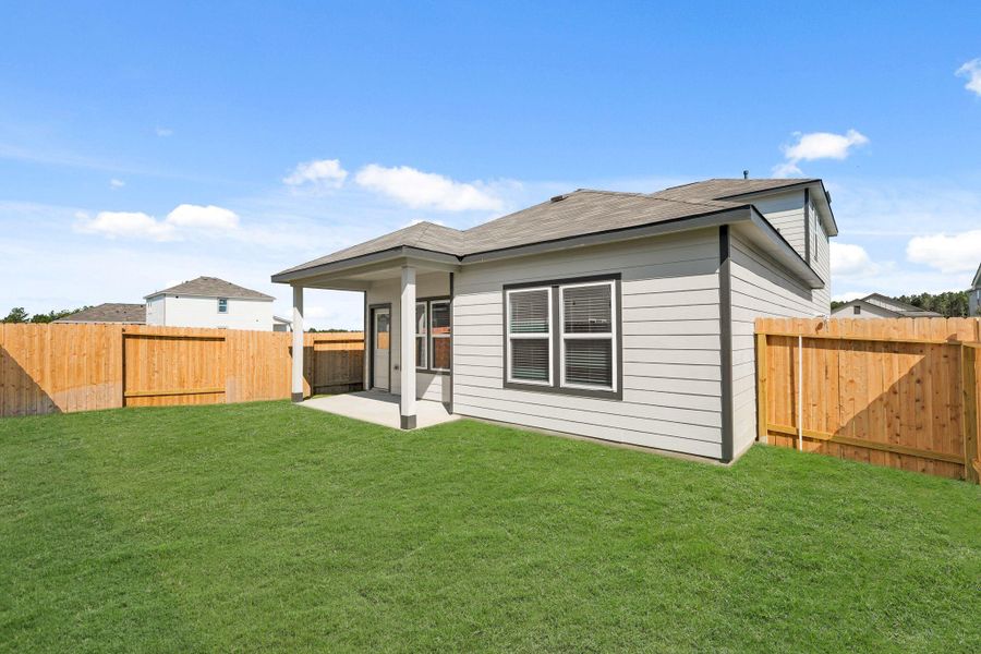 Exterior details and patio area of a home in Northpark South, Porter (Image 8). Exterior details and patio area of a home in Northpark South, Porter (Image 8).