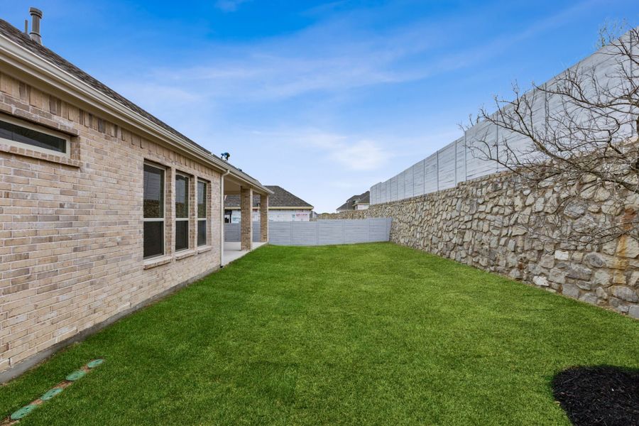 Exterior details and patio area of a home in Painted Tree Lakeside, McKinney (Image 23).