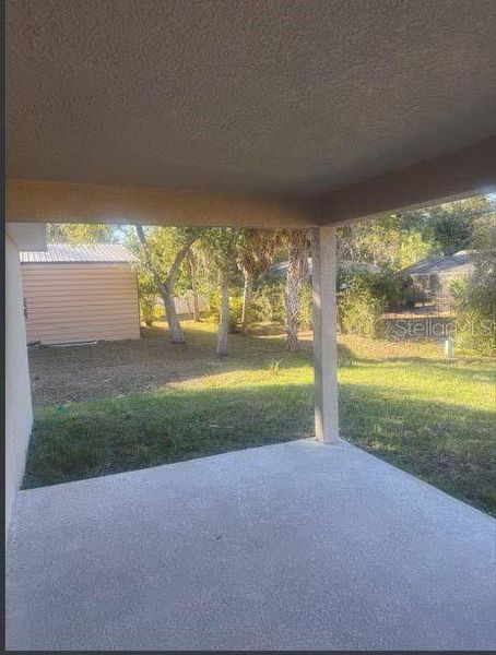 Exterior details and patio area of a home in , Port Charlotte (Image 10).