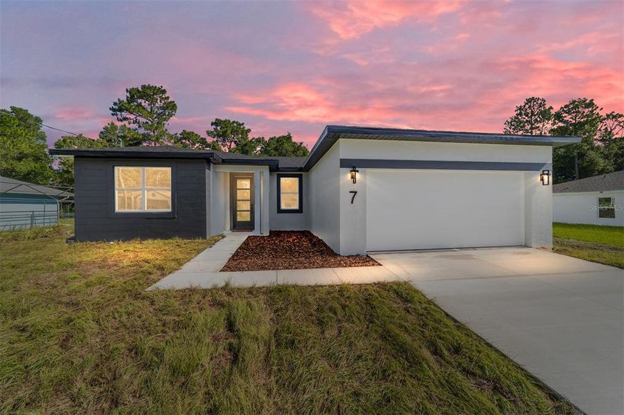 Front exterior of a new home in , Ocala, FL, highlighting curb appeal (Image 31).