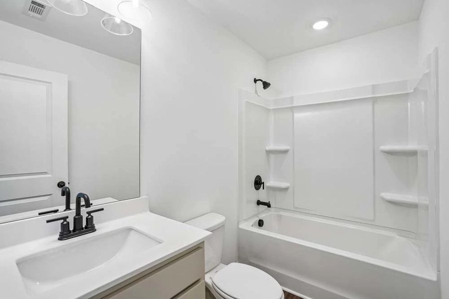 Bathroom Two featuring Artisan Collection Finishes Bathroom Two featuring Artisan Collection Finishes