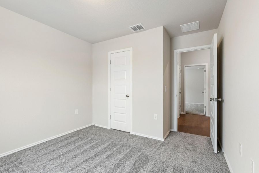 Spacious, unfurnished interior of a new home in Marble Creek Crossing, Austin (Image 9).