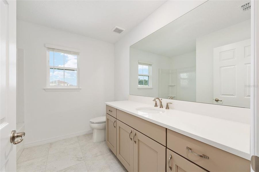 Furnished interior view inside a new home in Calesa Township, Ocala (Image 12).