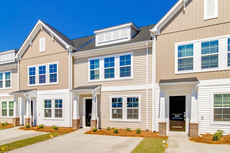 Front exterior of a new home in Astoria, Columbia, SC, highlighting curb appeal (Image 17).