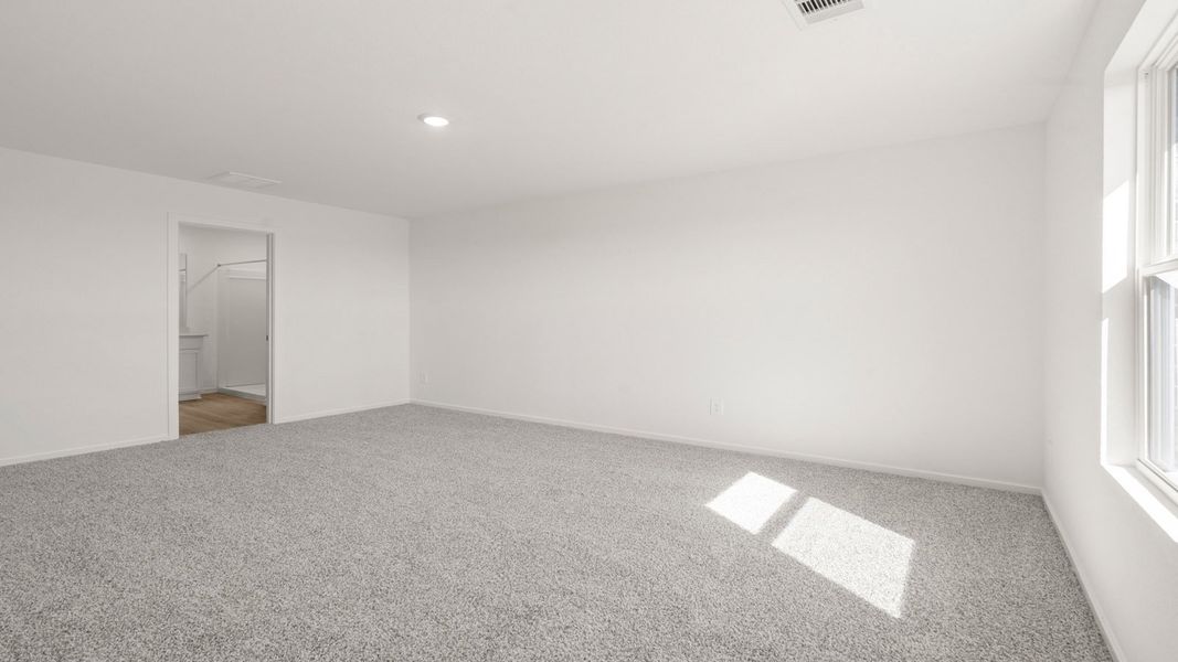 Spacious, unfurnished interior of a new home in Sunterra Lakes, Brookshire (Image 21).