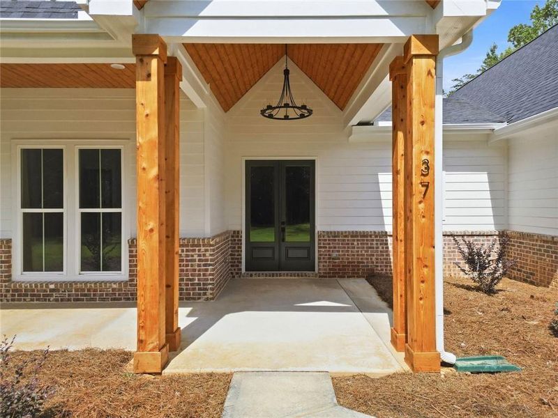 Exterior details and patio area of a home in , White (Image 25).