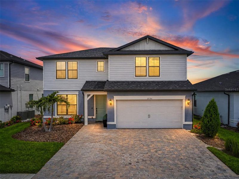 Front exterior of a new home in , North Port, FL, highlighting curb appeal (Image 21).