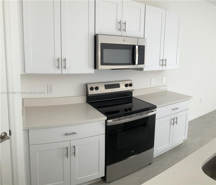 Furnished interior view inside a new home in , St. Cloud (Image 6).