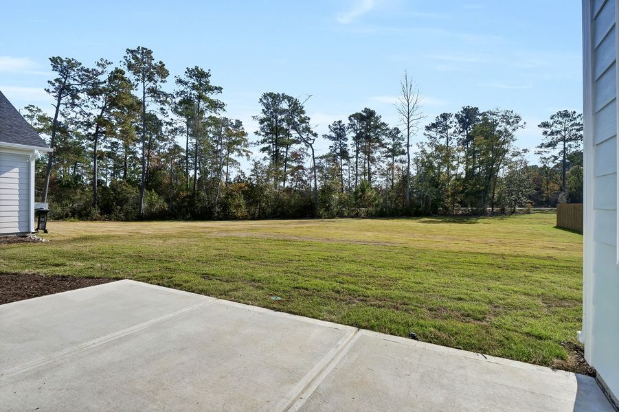 Exterior details and patio area of a home in Grand Park, Leland (Image 3).