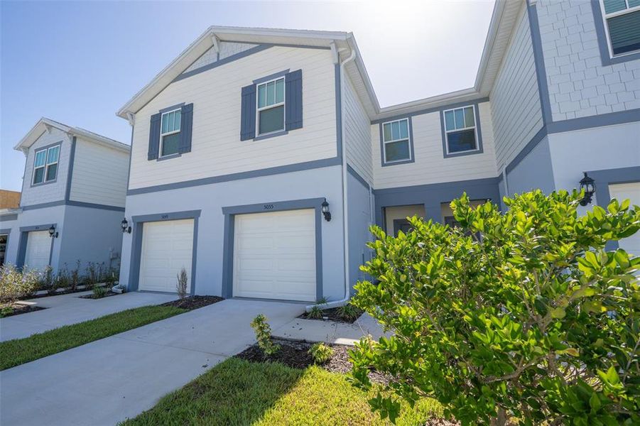 Front exterior of a new home in , Melbourne, FL, highlighting curb appeal (Image 22). Front exterior of a new home in , Melbourne, FL, highlighting curb appeal (Image 22).