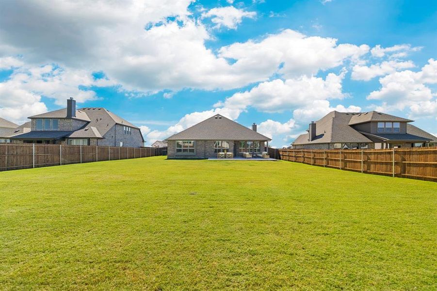 Exterior details and patio area of a home in Lovers Landing, Forney (Image 23).