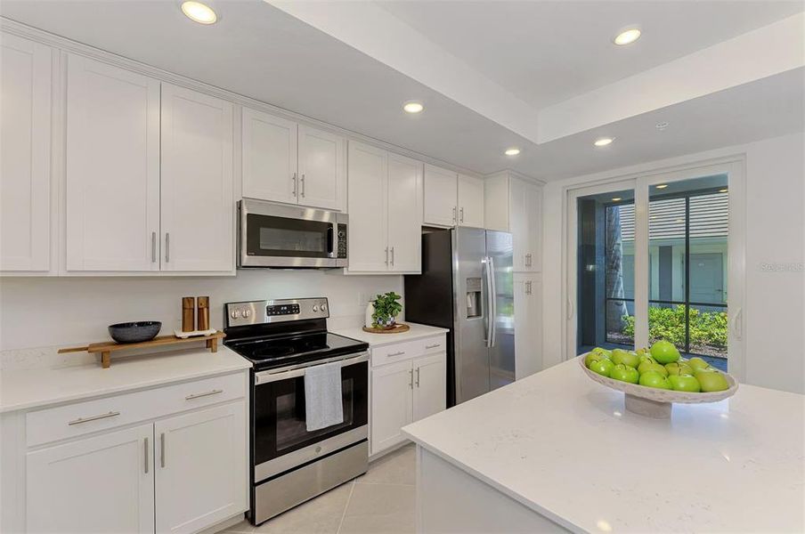 Furnished interior view inside a new home in Wellen Park Golf & Country Club, Venice (Image 47).