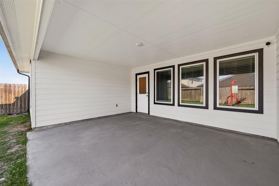 Exterior details and patio area of a home in Windstone on the Prairie, Richmond (Image 3).