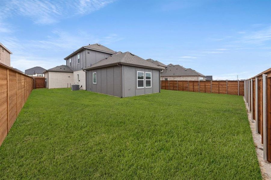 Exterior details and patio area of a home in Solterra, Mesquite (Image 4).