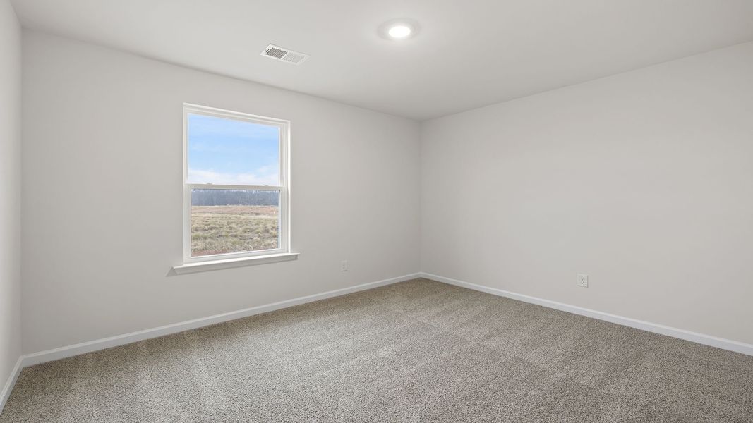Spacious, unfurnished interior of a new home in Bentley Park, Greenwood (Image 20).