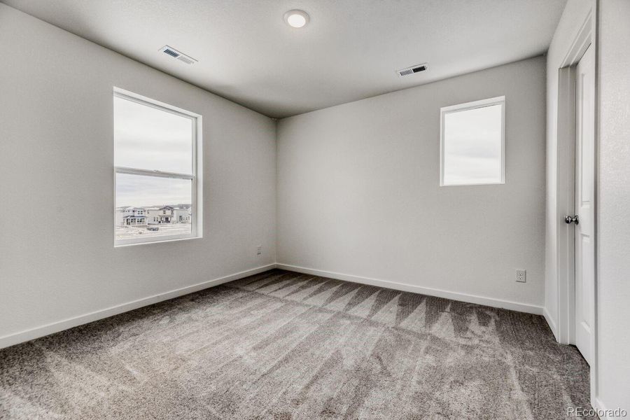 Spacious, unfurnished interior of a new home in Percheron: The Camden Collection, Colorado Springs (Image 9).