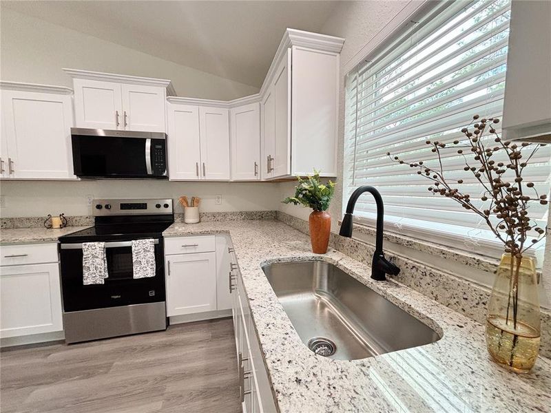 Furnished interior view inside a new home in , Dunnellon (Image 14).