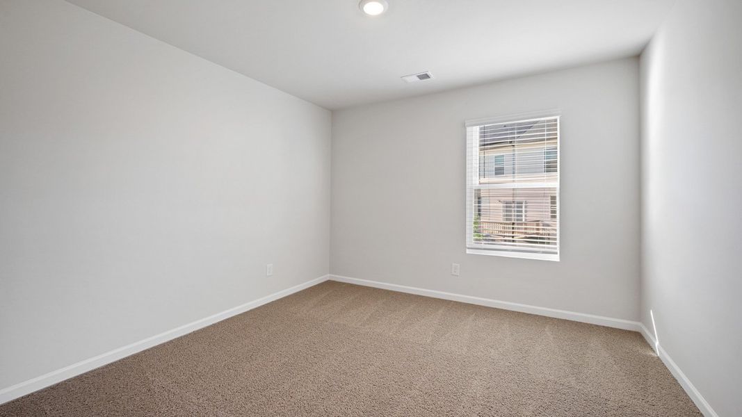 Spacious, unfurnished interior of a new home in The Reserve at Calcutta, Stockbridge (Image 26).