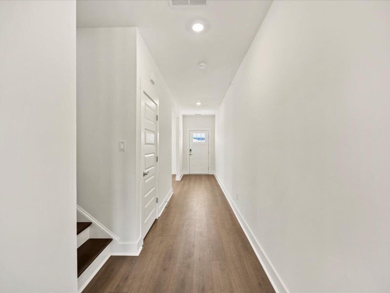 Spacious, unfurnished interior of a new home in The Coves at Lakes of Cane Bay, Summerville (Image 11). Spacious, unfurnished interior of a new home in The Coves at Lakes of Cane Bay, Summerville (Image 11).