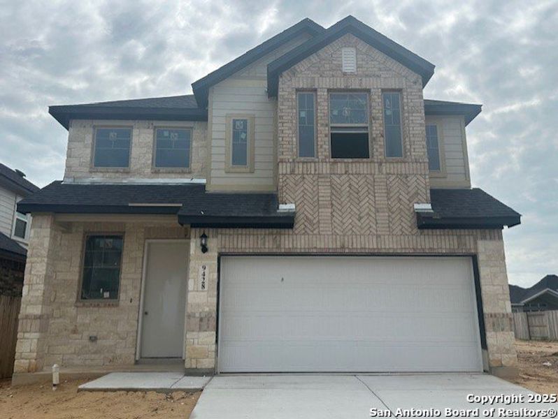 Front exterior of a new home in Stillwater Ranch, San Antonio, TX, highlighting curb appeal (Image 27). Front exterior of a new home in Stillwater Ranch, San Antonio, TX, highlighting curb appeal (Image 27).