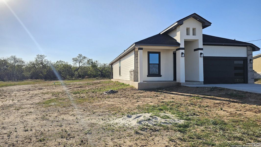 Exterior details and patio area of a home in , Atascosa (Image 4). Exterior details and patio area of a home in , Atascosa (Image 4).