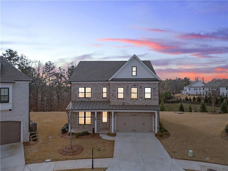 Front exterior of a new home in , Buford, GA, highlighting curb appeal (Image 1). Front exterior of a new home in , Buford, GA, highlighting curb appeal (Image 1).