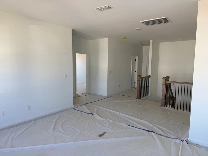 Loft featuring the AW Collection® Rosemary - Flexible living wrapped in warmth and wood.