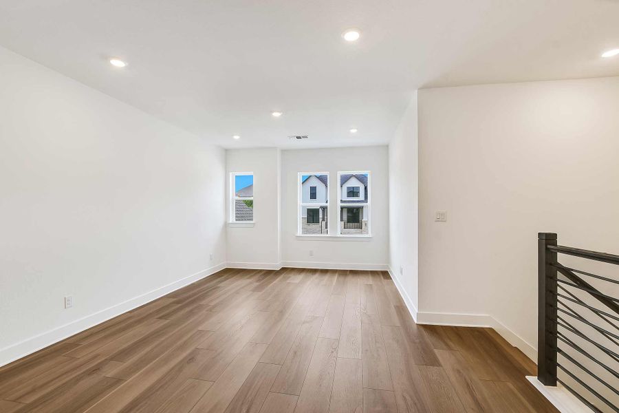 Representative unfurnished interior of a home built from the The Tomball by David Weekley Homes in Wolf Ranch – West Bend, Georgetown (Image 16). Representative unfurnished interior of a home built from the The Tomball by David Weekley Homes in Wolf Ranch – West Bend, Georgetown (Image 16).