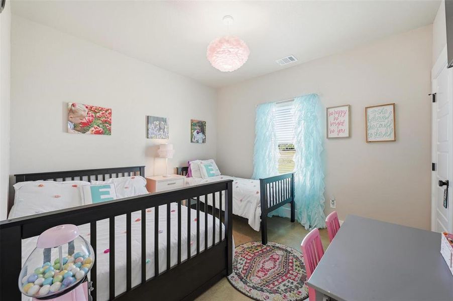 Bedroom featuring carpet Bedroom featuring carpet