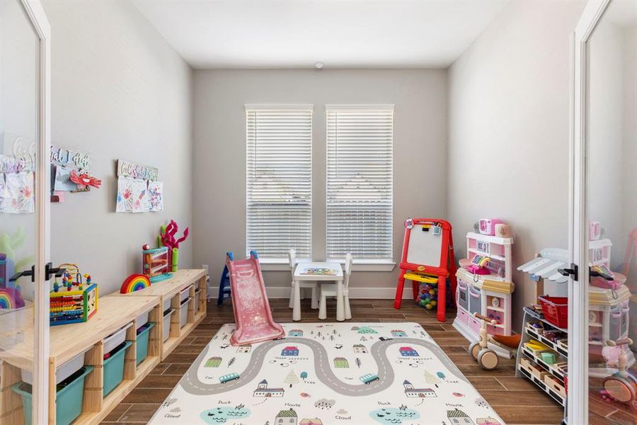 Home office currently being used as a playroom. This spacious study is perfect for a office, craftroom, or playroom!