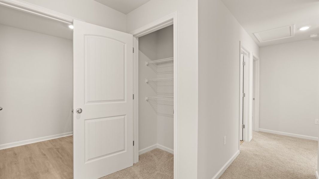 Representative unfurnished interior of a home built from the Robie by D.R. Horton in Rolling Meadows, Jasper (Image 26). Representative unfurnished interior of a home built from the Robie by D.R. Horton in Rolling Meadows, Jasper (Image 26).