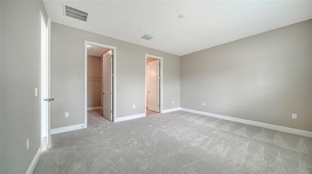 Spacious, unfurnished interior of a new home in Wildleaf at North River Ranch, Parrish (Image 31).