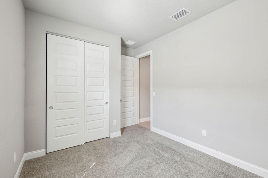Spacious, unfurnished interior of a new home in Brystol at Wylder - Reserve Series, Port St. Lucie (Image 25).